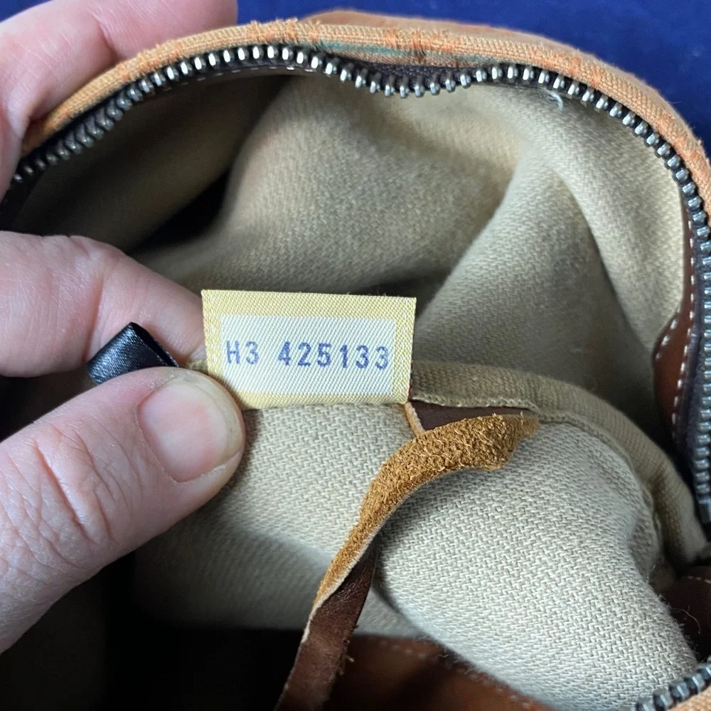 Dooney & Bourke Vintage burnt Orange over the shoulder bucket Bag